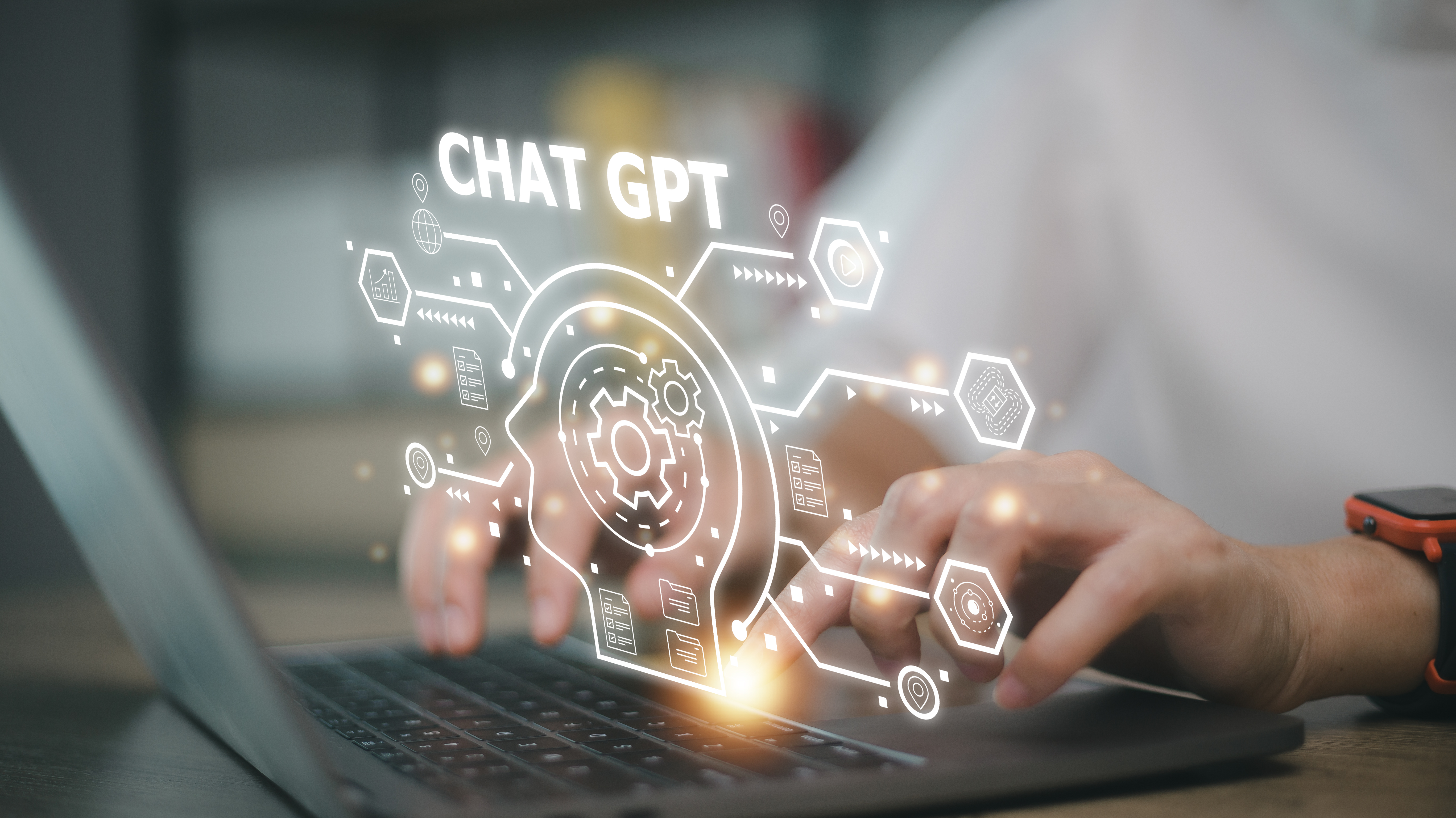 typing on laptop with Chat GPT graphic